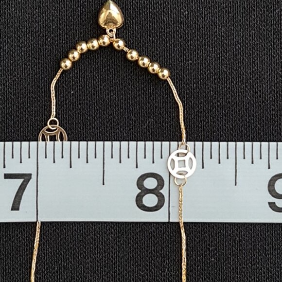 18k Bracelet with small balls and cute money catcher design as charm - Picture 9 of 16